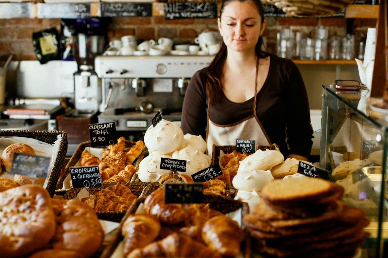 A baker at a bread counter