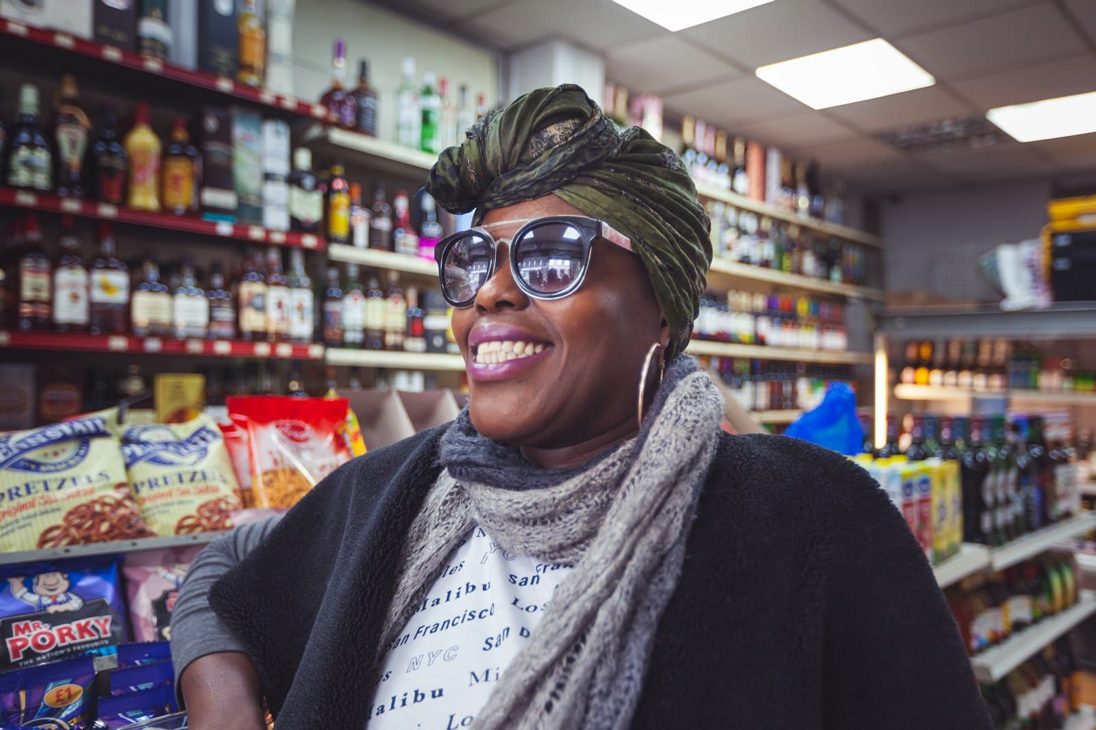 A shopkeeper in her shop