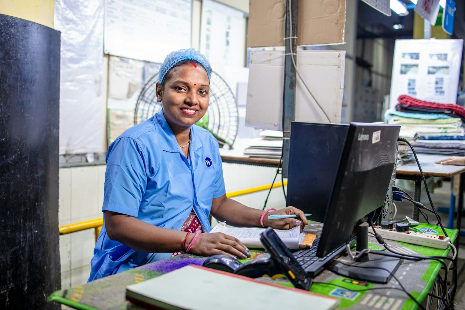 A staff member at her workstation